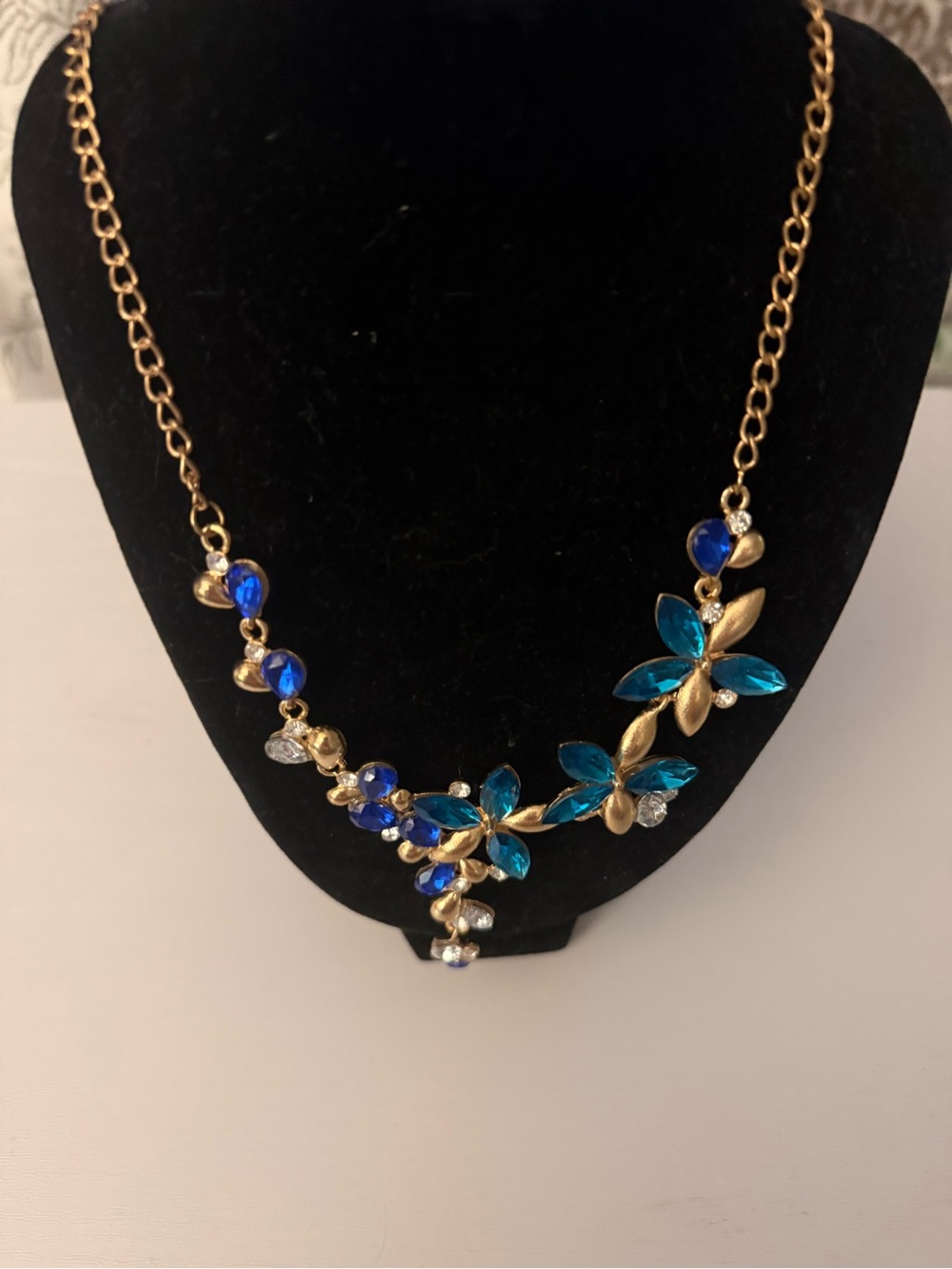 Gold Floral Necklace with Blue and Teal Crystals